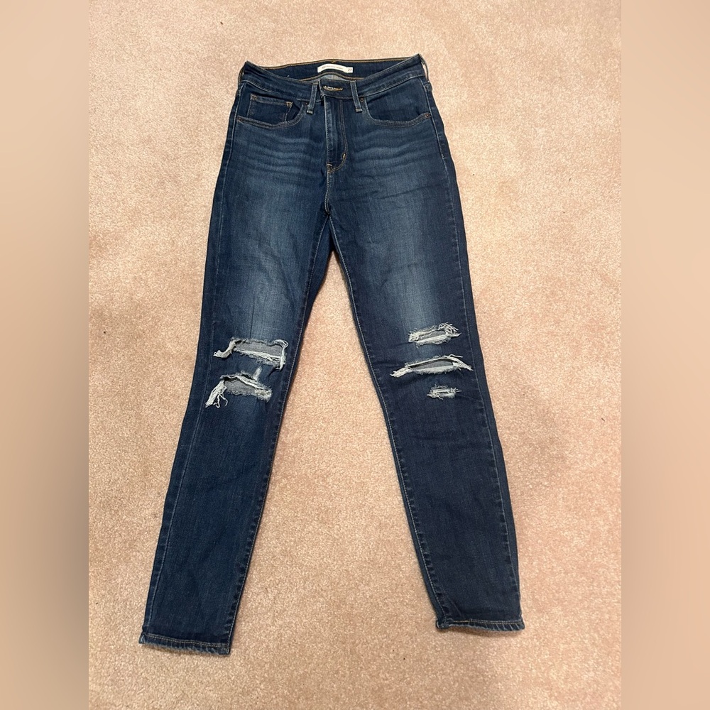 Levi’s high rise skinny jeans with distressing